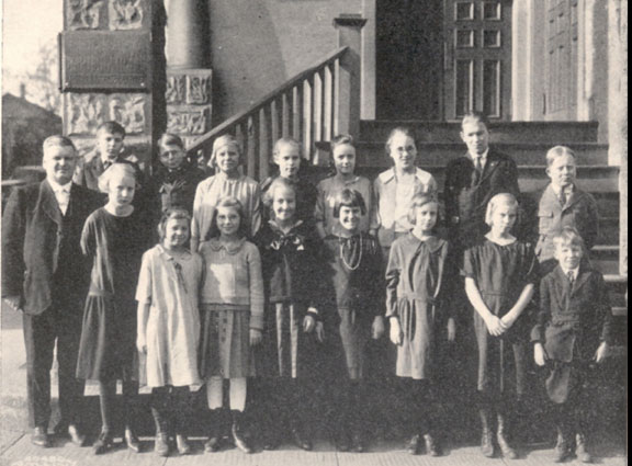 Pastor Sjolander and his Bible Class in front of the church at 15th and Hoyt