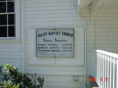 The information sign on the side of the church.