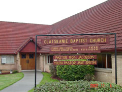 The sign in front of the church states that Ron Jacobson is pastor and youth pastor is Jake Smith