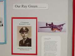 Ray's picture in uniform and the plane Don Strandberg made for him.