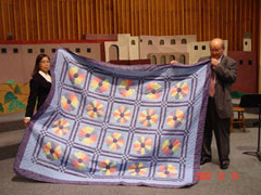 Presented to Pastor Cam and Hanh by the Temple Quilters