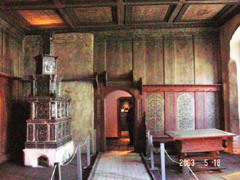Inside Martin Luthers house in Wittenburg.  Heater on left - table on right