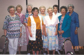 1995 Quilt Group Left to Right: Betty Carlson, Marilyn Nelson, Edith Ryberg, Virginia  Fletcher, Bev Loy, Lillian Anderson, Joan Bidgood, Sumi Shimomura, Francis Brandon - Taken in the Upper Room