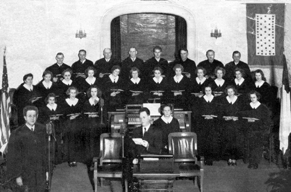 Picture taken of the choir - Notice the flag commerating members who were serving in the Armed Forces.  WWII